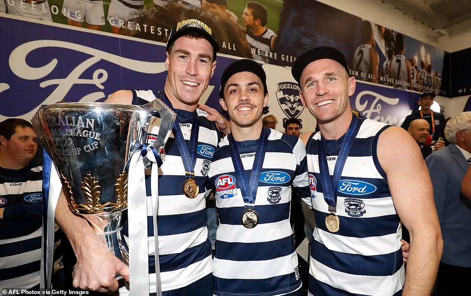 62756599-11245809-Jeremy_Cameron_Brad_Close_and_Joel_Selwood_of_the_Cats_celebrate-a-104_1664036824958.jpg