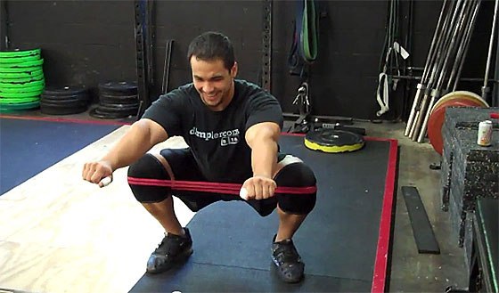 Ben-Claridad-Band-Squat-Knees-Out-drill.jpg