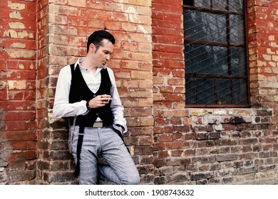 distraught-man-smoking-cigarette-while-260nw-1908743632.jpg