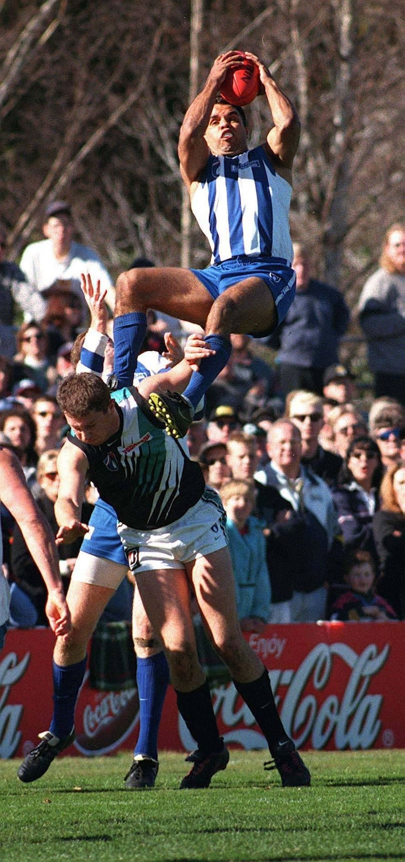 Winston Abraham takes the AFL’s mark of the year in 1998.