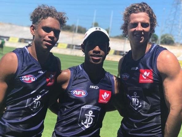 Liam Henry (left) with Brownlow medallist Nat Fyfe at Dockers training.