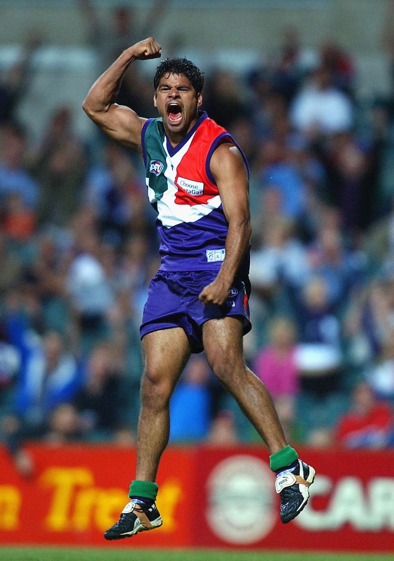 Jeff Farmer celebrates kicking a goal at Subiaco Oval in 2002.