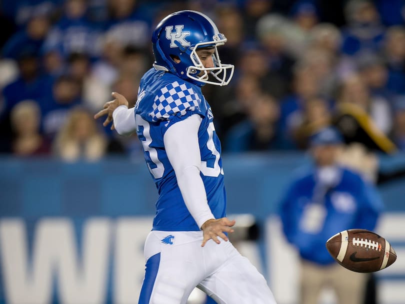 Max Duffy punts the ball during the first half of an NCAA college football game in 2018.