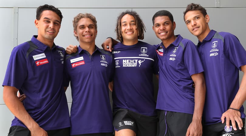 Fremantle Dockers Next Generation Academy coach Tendai Mzungu with young recruits Jason Carter, Liam Henry, Isaiah Butters and Leno Thomas.