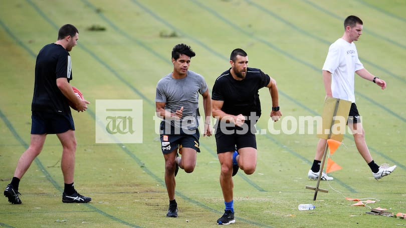 Jeremy McGovern, Anthony Treacy, Josh Kennedy and Oscar Allen at McGillivray Oval this morning.