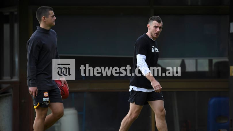 Hamish Brayshaw and Luke Shuey at McGillivray Oval this morning.