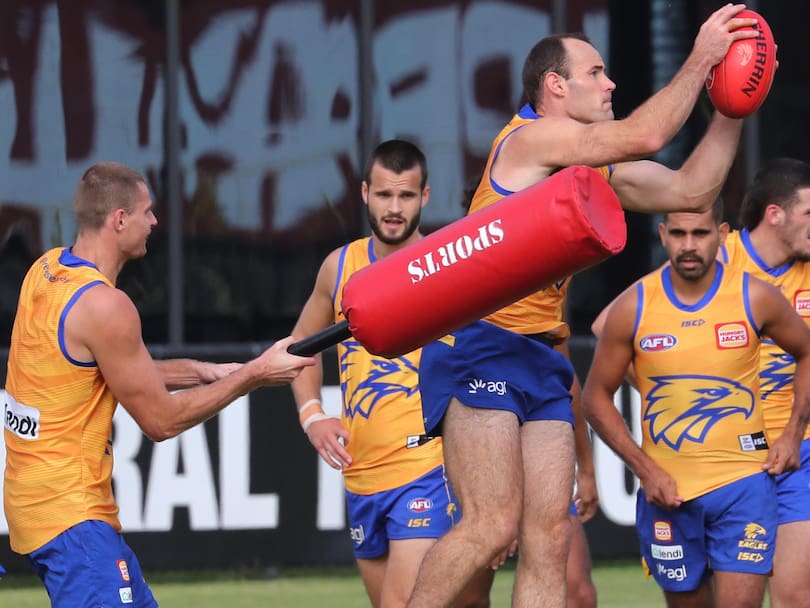 Shannon Hurn gets a belting from Nathan Vardy.