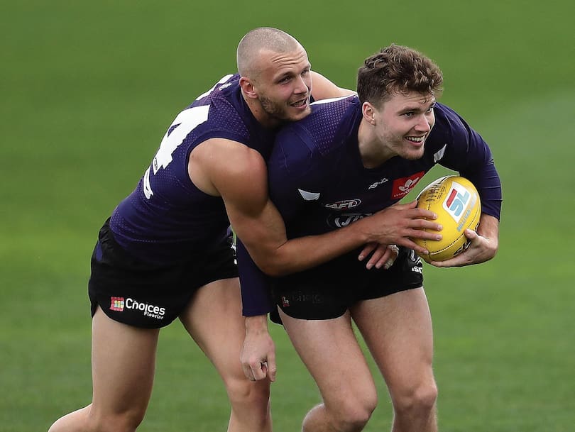 Brett Bewley tackles Blake Acres during a contact training session at Cockburn.