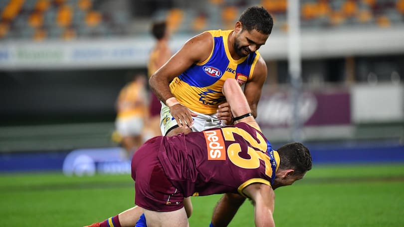 Lewis Jetta of the Eagles is seen grappling with Daniel McStay of the Lions during the Round 3 AFL match between the Brisbane Lions and the West Coast Eagles at The Gabba.