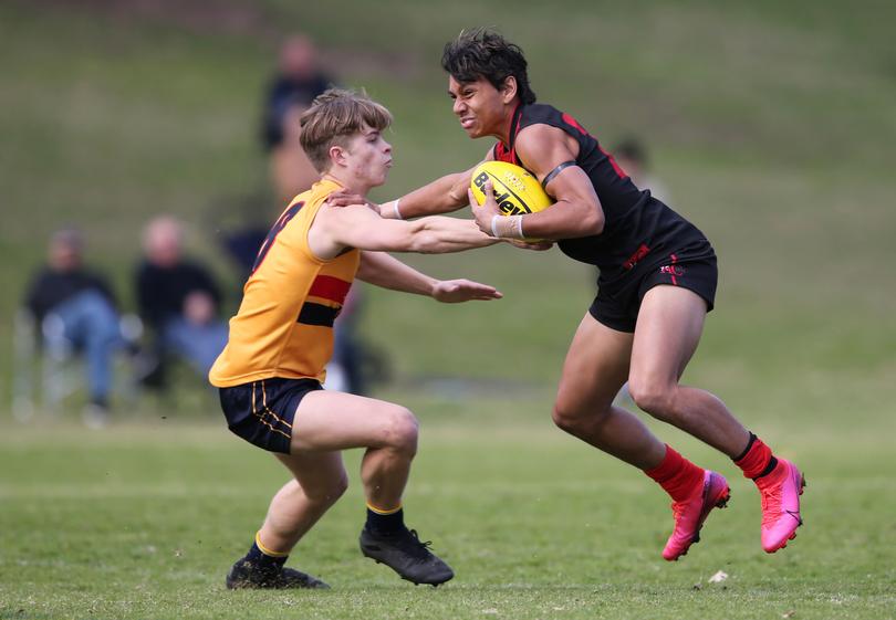 Jesse Motlop playing for Aquinas last season, when he topped the PSA goal kicking.