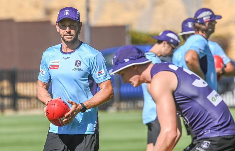 Former West Coast spearhead [PLAYERCARD]Mark LeCras[/PLAYERCARD] helps out Fremantle forward Josh Treacy.