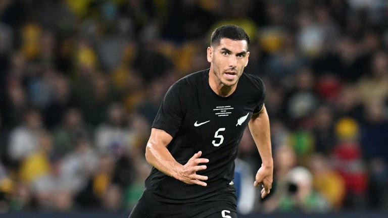 New Zealand have abandoned a soccer match after Michael Boxall was racially abused by an opponent.