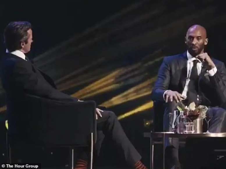 Kobe Bryant standing in front of a piano: His message for the fans in attendance was to 'do what you love' and to do it 'to the best of your ability' no matter it is that you love (pictured speaking at Crown Pavilion)