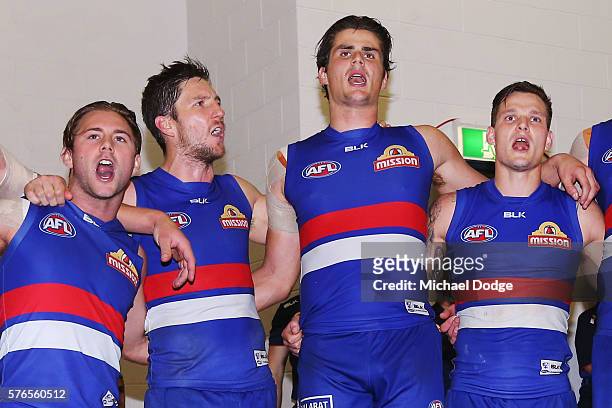 cairns-australia-caleb-daniel-matthew-boyd-tom-boyd-and-clay-smith-of-the-bulldogs-sing-the.jpg