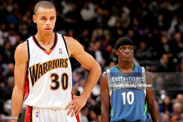 stephen-curry-of-the-golden-state-warriors-looks-on-as-jonny-flynn-of-the-minnesota.jpg