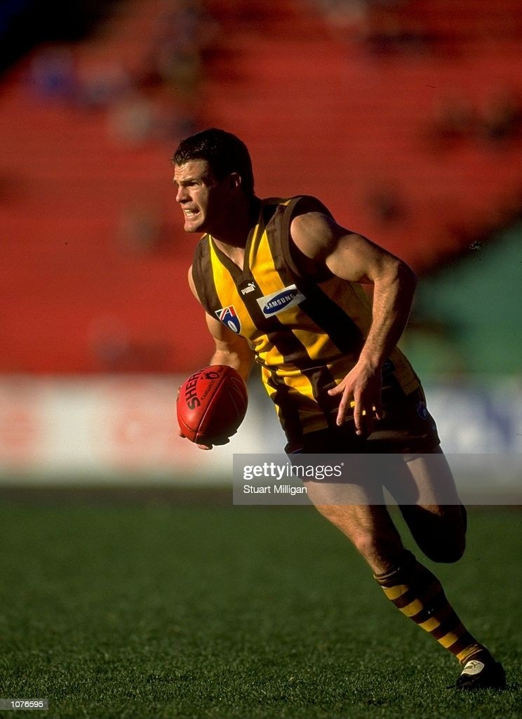 aug-1999-richard-taylor-of-hawthorn-in-action-during-the-afl-round-19-picture-id1076595