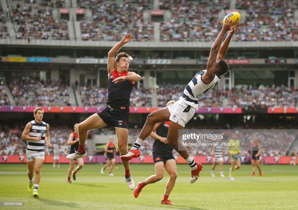 esava-ratugolea-of-the-cats-and-michael-hibberd-of-the-demons-compete-picture-id937641598