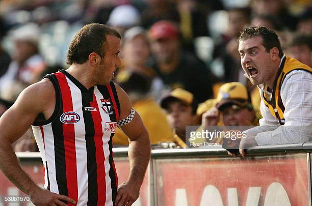 fraser-gehrig-for-the-saints-listens-to-the-abuse-from-a-hawks-fan-picture-id53051570