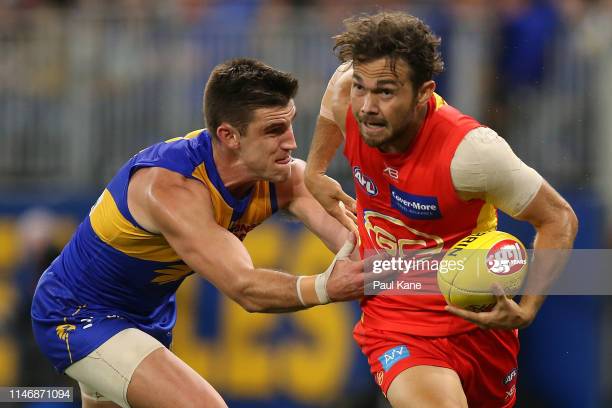 jarrod-harbrow-of-the-suns-breaks-from-elliot-yeo-of-the-eagles-the-picture-id1146871094