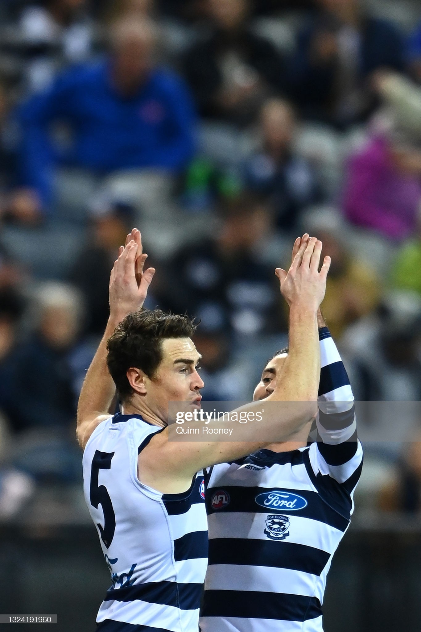 jeremy-cameron-of-the-cats-is-congratulated-by-luke-dahlhaus-after-a-picture-id1324191960