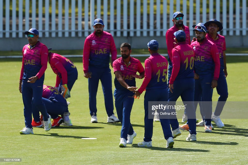 kashif-daud-of-the-uae-and-team-mates-celebrate-during-the-icc-2022-picture-id1432157006