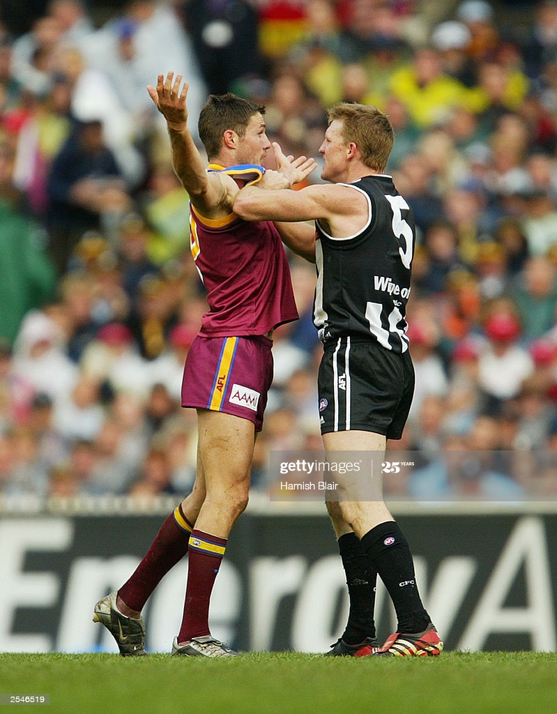 nathan-buckley-for-collingwood-clashes-with-robert-copeland-for-the-picture-id2546519