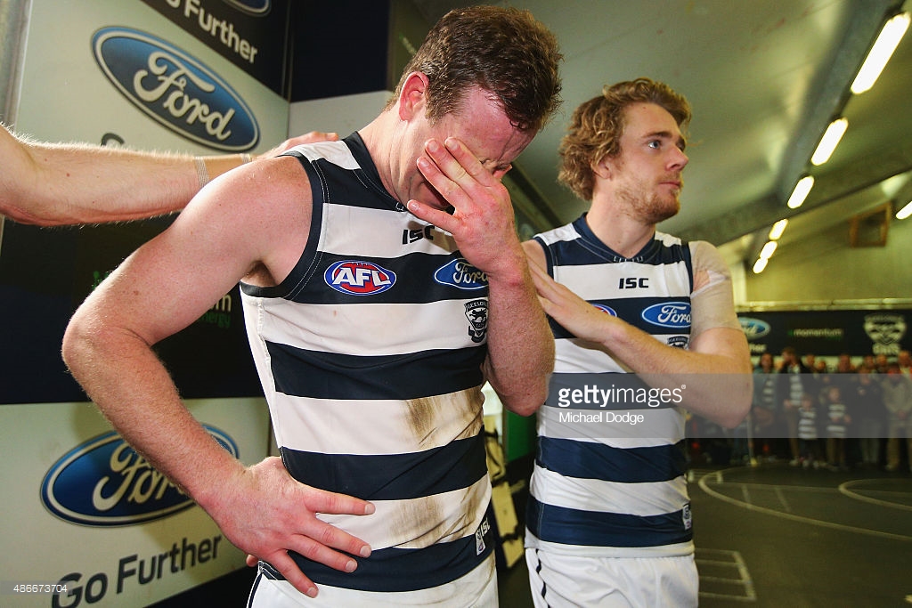 steve-johnson-of-the-cats-cries-with-cameron-guthrie-after-playing-picture-id486673704