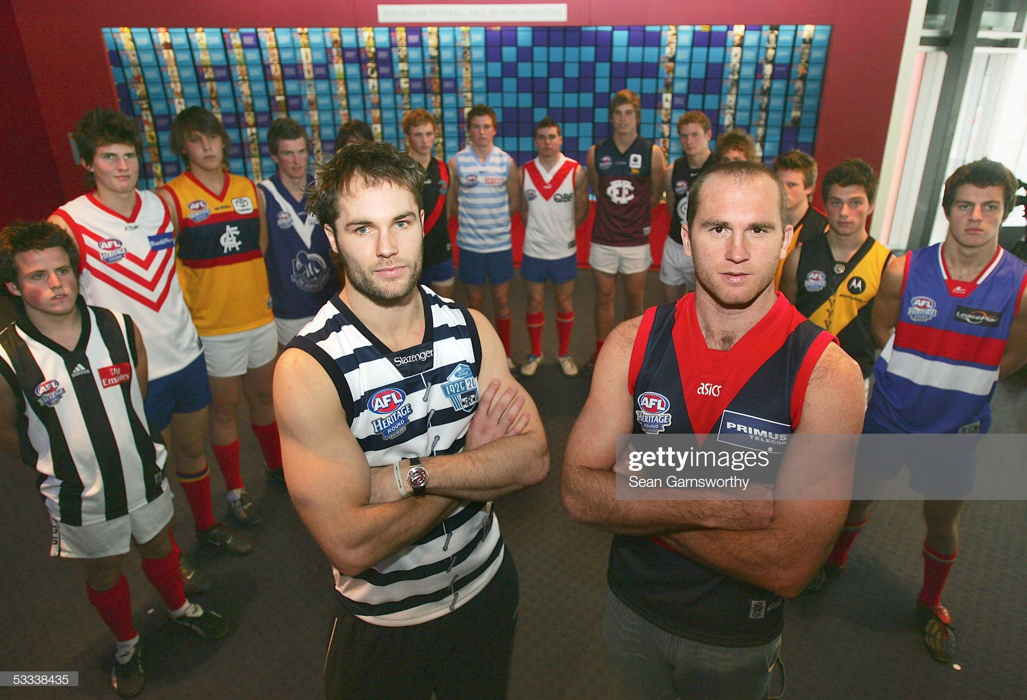 tom-harley-wearing-a-geelong-jumper-and-david-neitz-wearing-a-jumper-picture-id53338435