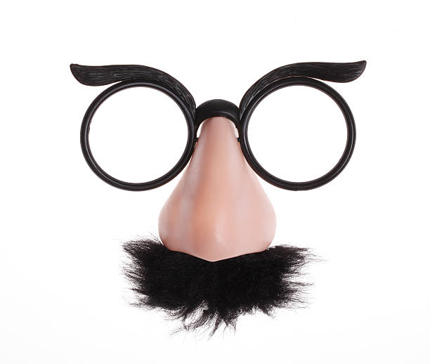 classic-glasses-and-mustache-disguise-on-white-background-picture-id173507466