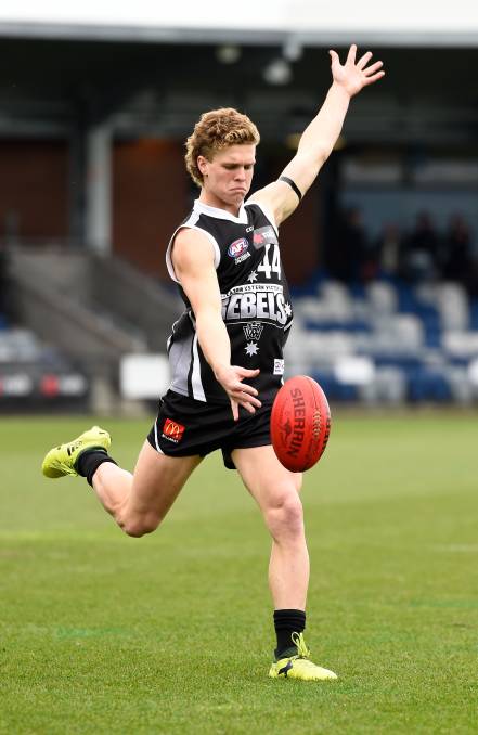 Hobbs warms up for the Rebels. Picture: ADAM TRAFFORD/BALLARAT COURIER