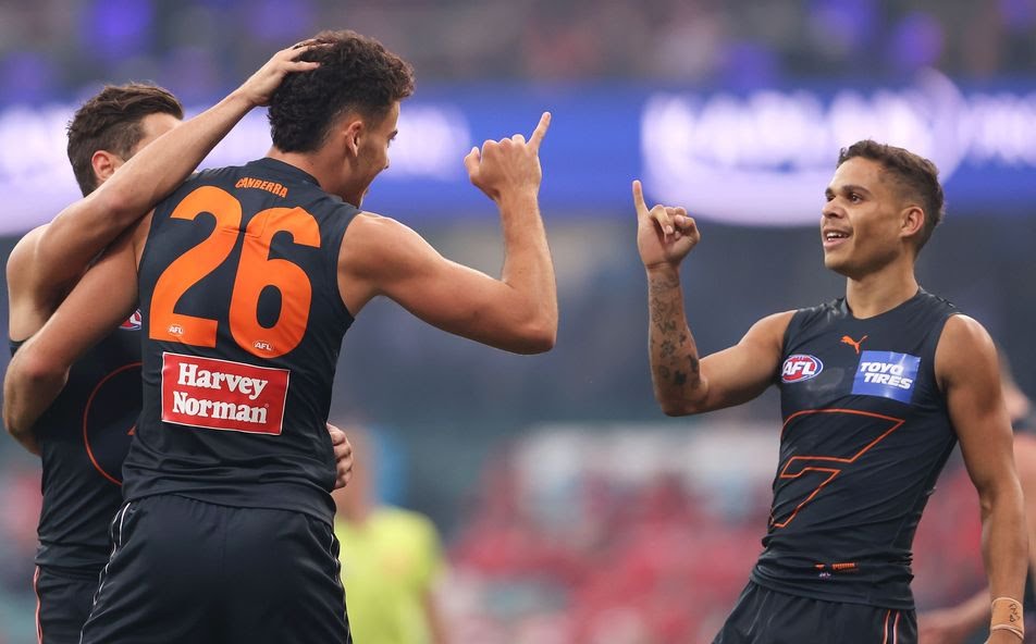Jake Riccardi and Bobby Hill celebrate a Giants goal. Picture: AFL Photos