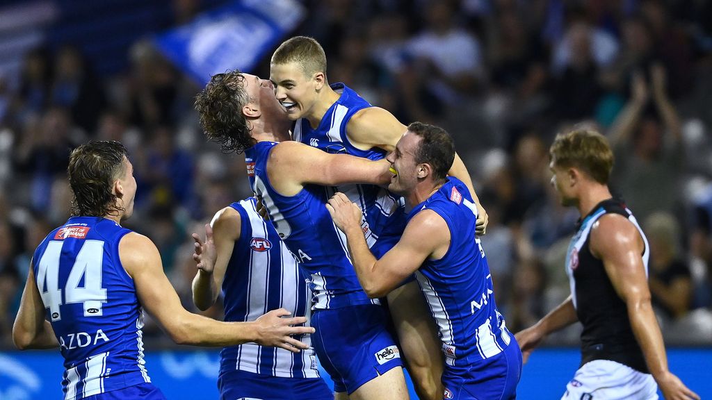 North Melbourne's Tom Powell celebrates a goal against Port Adelaide in round 1, 2021. Picture: AFL Photos