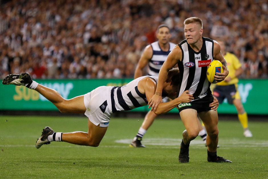 Jordan De Goey in action against the Cats in round one - Collingwood Magpies,Geelong Cats