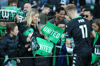 United's Connor Pain signs autographs fans. It's hoped the Tarneit ground will strength the new club's fan base. 