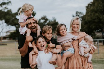 Eddie Betts with partner Anna and their children.