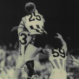 Collingwood's Ron McKeown leaps over Michael Passmore in 1986.