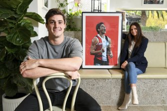 St Kilda co-captain Jack Steele with artist Dom Gauci and her artwork of him.