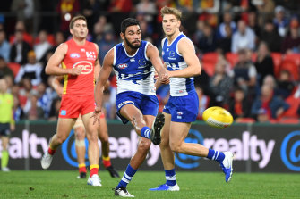 Tarryn Thomas kicks a goal in round 12. 