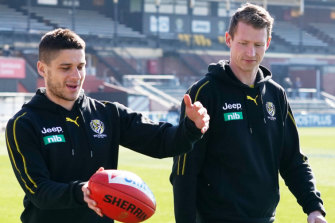 Grimes walks laps at Punt Road with Dion Prestia.