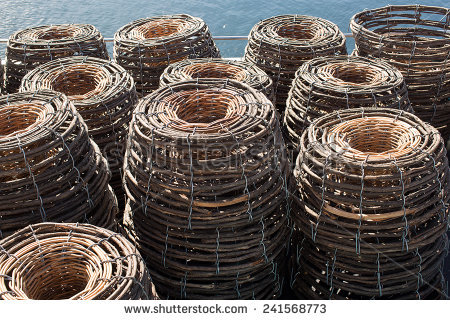 stock-photo-traditional-cane-craypots-sitting-on-the-deck-of-a-cray-fishing-boat-241568773.jpg