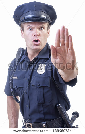 stock-photo-male-caucasian-police-officer-in-blue-cop-uniform-holds-up-hand-in-stop-gesture-on-white-background-188469734.jpg