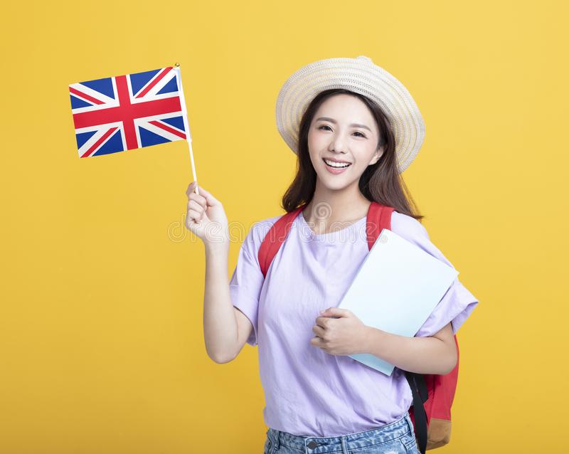 young-asian-girl-student-showing-united-kingdom-flag-young-asian-girl-student-showing-united-kingdom-flag-156876969.jpg