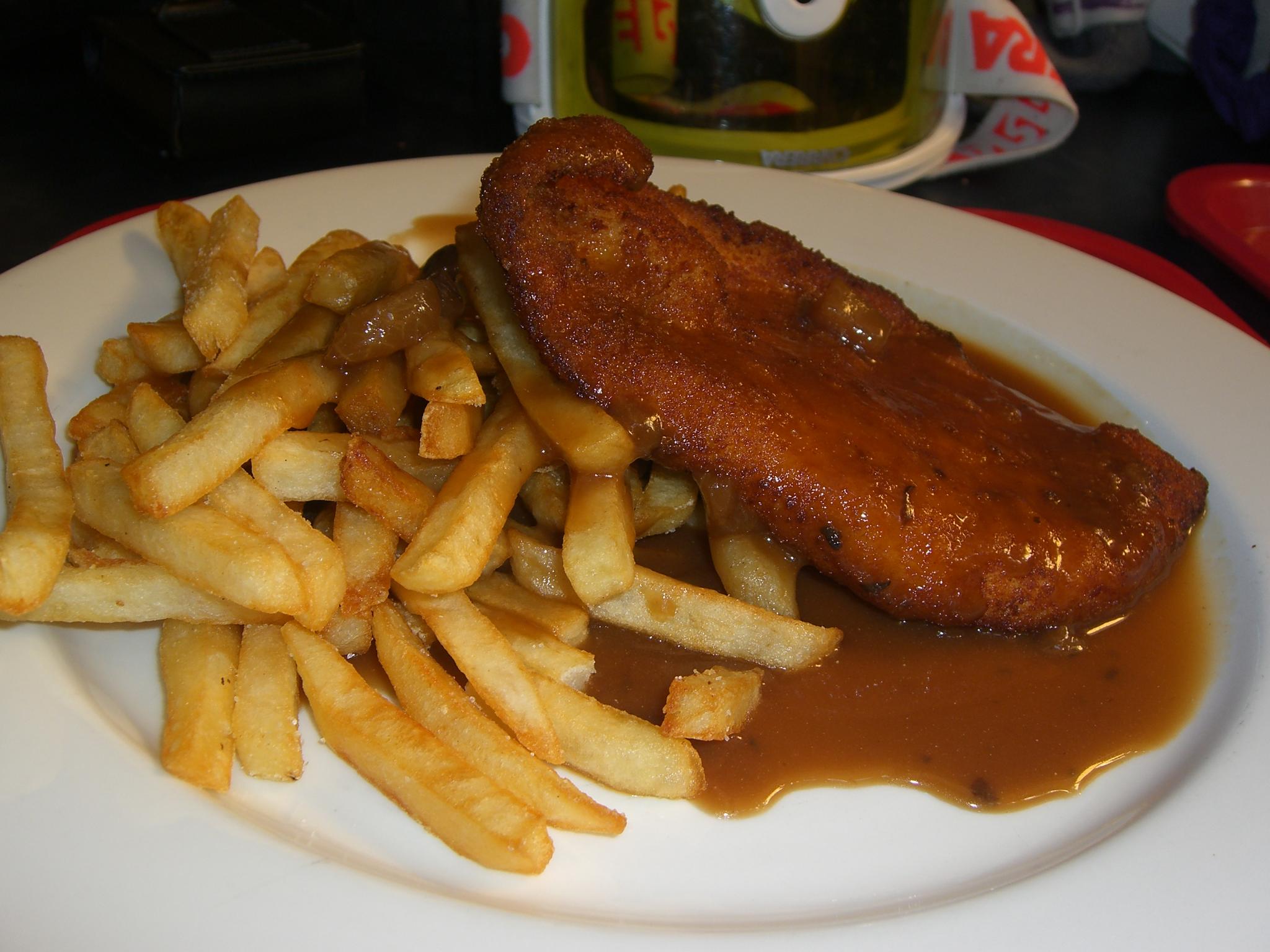 Chicken_schnitzel_and_chips_with_jaeger_gravy.jpg