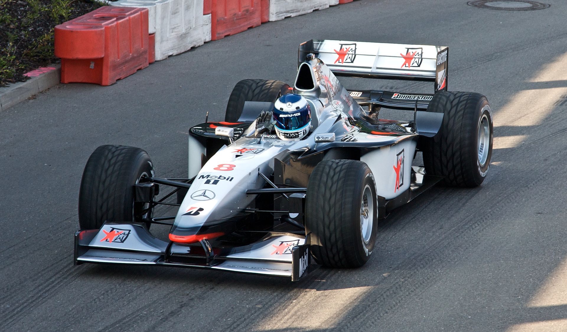 1920px-Mika_Hakkinen_2008_Stars_and_Cars_McLaren_MP4-13.jpg