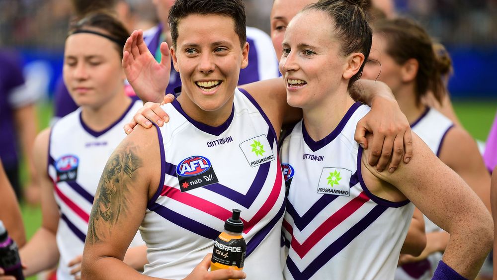 Evie-Gooch-left-celebrates-Fremantle-s-win-with-teammate-Kara-Antonio.JPG