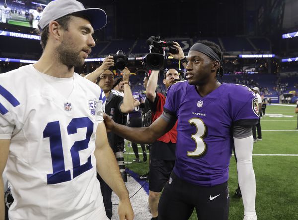 Indianapolis Colts quarterback Andrew Luck (12) and Baltimore Ravens quarterback Robert Griffin III (3) speak following an NFL preseason football game in Indianapolis, Monday, Aug. 20, 2018. The Ravens defeated the Colts 20-19. (AP Photo/Darron Cummings)